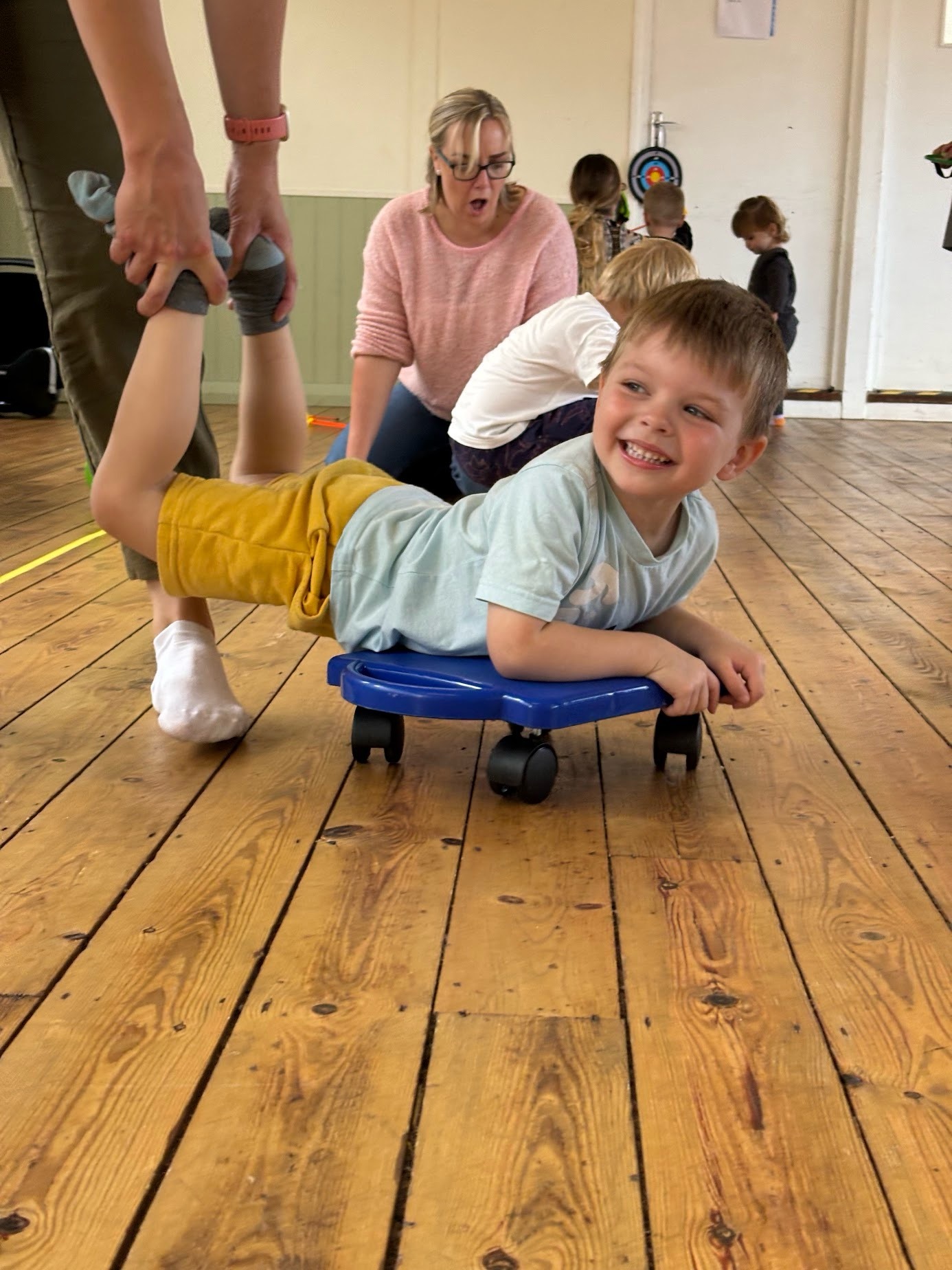 Child enjoying a movement challenge at Happy Little Movers